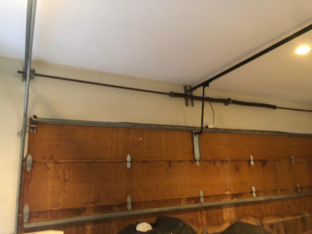 Affordable Broken Torsion Springs Repair and Replacement - Garage Tec